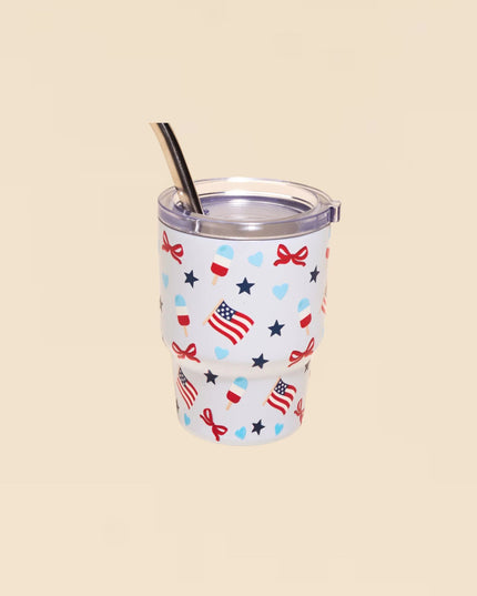 Tumbler with patriotic design on a beige background