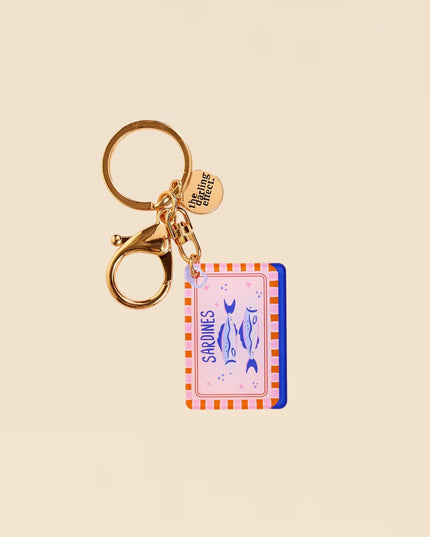 Keychain with a card design on a beige background