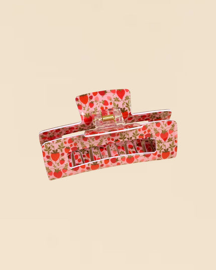 Floral-patterned pencil case on a beige background