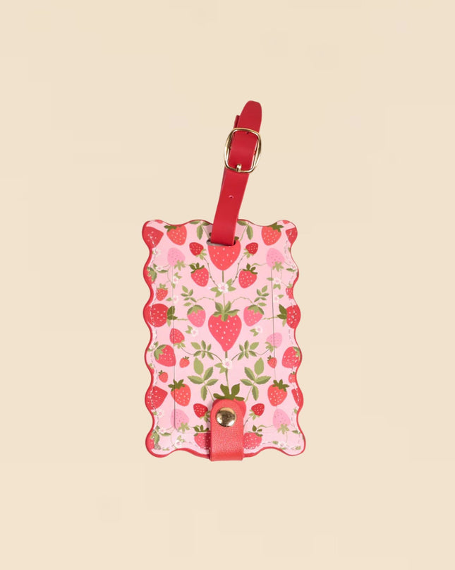 Luggage tag with strawberry pattern on a beige background