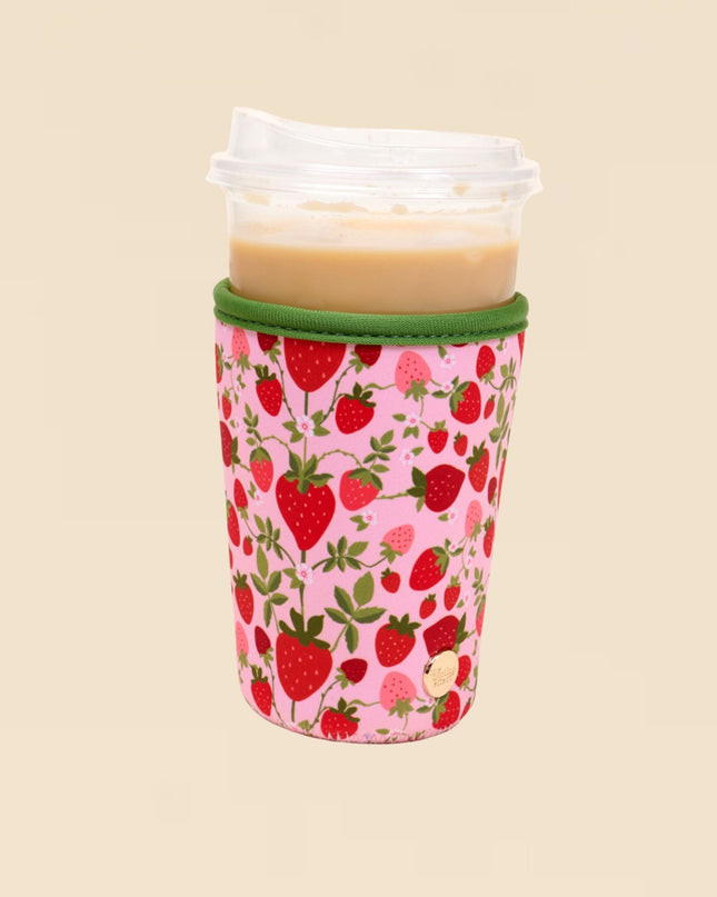 Tumbler with a strawberry pattern on a beige background