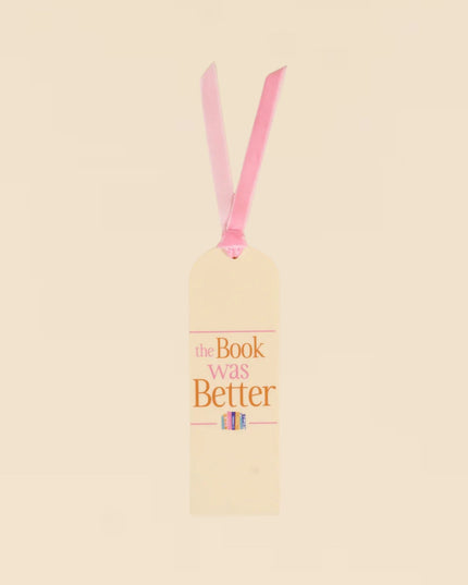 Beige bookmark with pink ribbon and text on a beige background