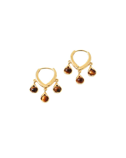 A pair of gold hoop earrings with three dangling teardrop-shaped brown gemstones on each earring, shown against a plain white background.