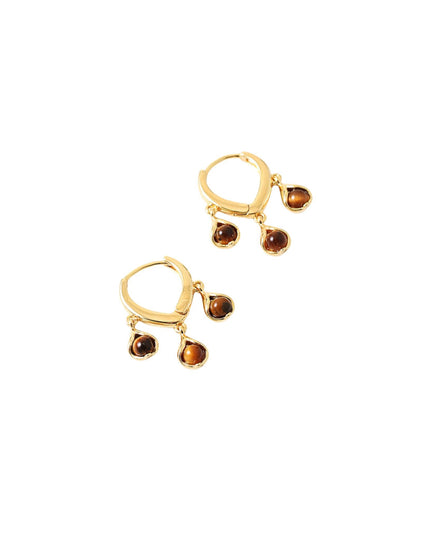 A pair of gold huggie hoop earrings with three dangling teardrop-shaped brown gemstones on each earring, shown on a plain white background.