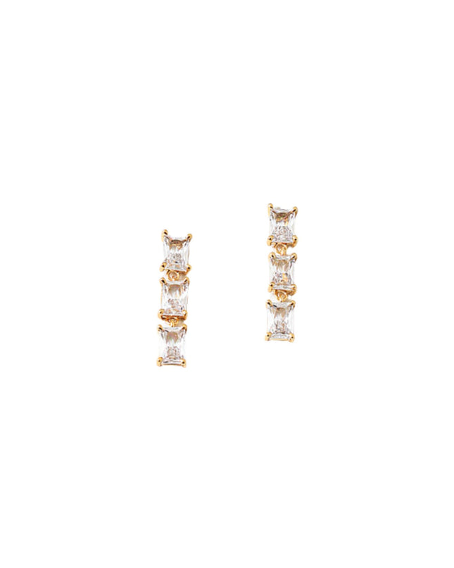 Pair of gold and rose gold stud earrings with clear gemstones on a white background