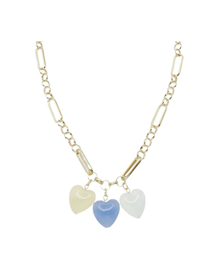 A gold-toned chain necklace featuring three dangling heart charms in pale yellow, light blue, and frosted white, displayed against a solid white background.