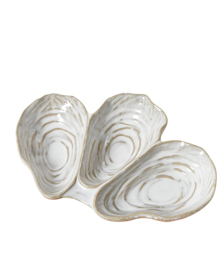 Decorative ceramic oyster shell on a white background