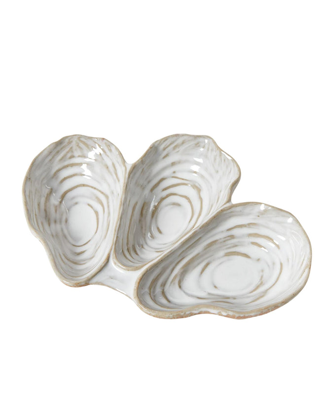 Decorative ceramic oyster shell on a white background