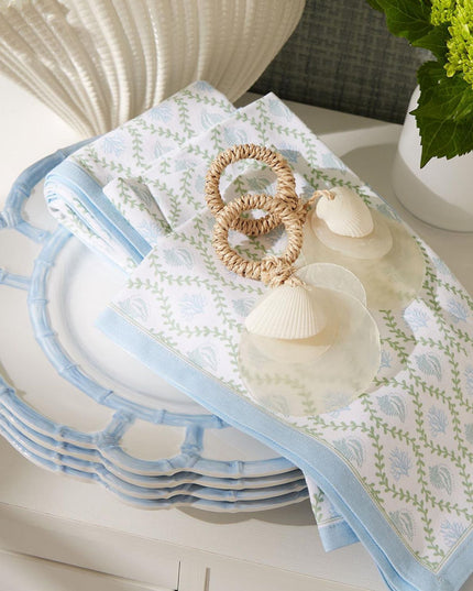 Set of plates with a decorative cloth on a table