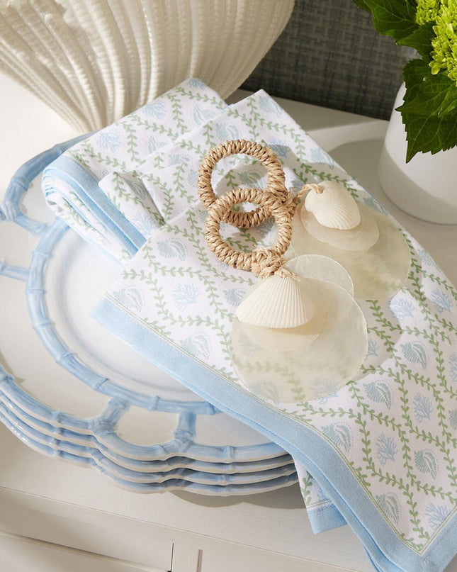 Set of plates with a decorative cloth on a table
