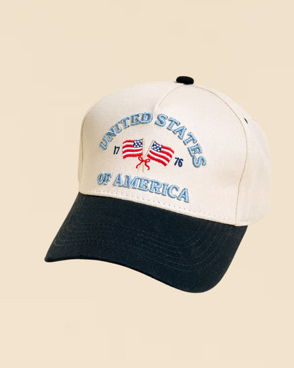 Cap with 'United States of America' text and flag design on a beige background