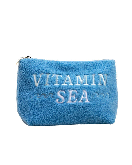 Blue pouch with 'Vitamin Sea' text on a white background